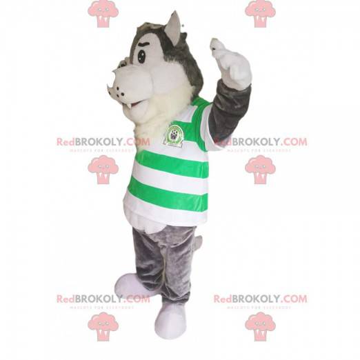 Mascotte de loup gris avec un maillot rayé vert et blanc -