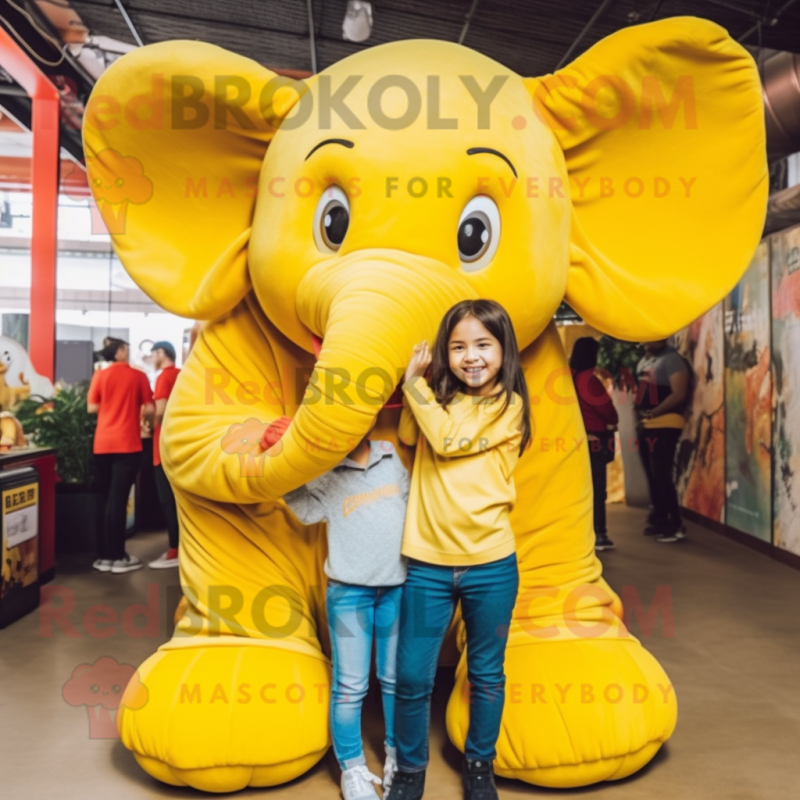 Yellow Elephant mascot costume character dressed with a Mom Jeans and Belts