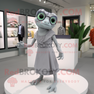 Gray Geckos mascot costume character dressed with a Midi Dress and Eyeglasses