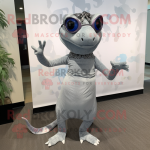 Gray Geckos mascot costume character dressed with a Midi Dress and Eyeglasses