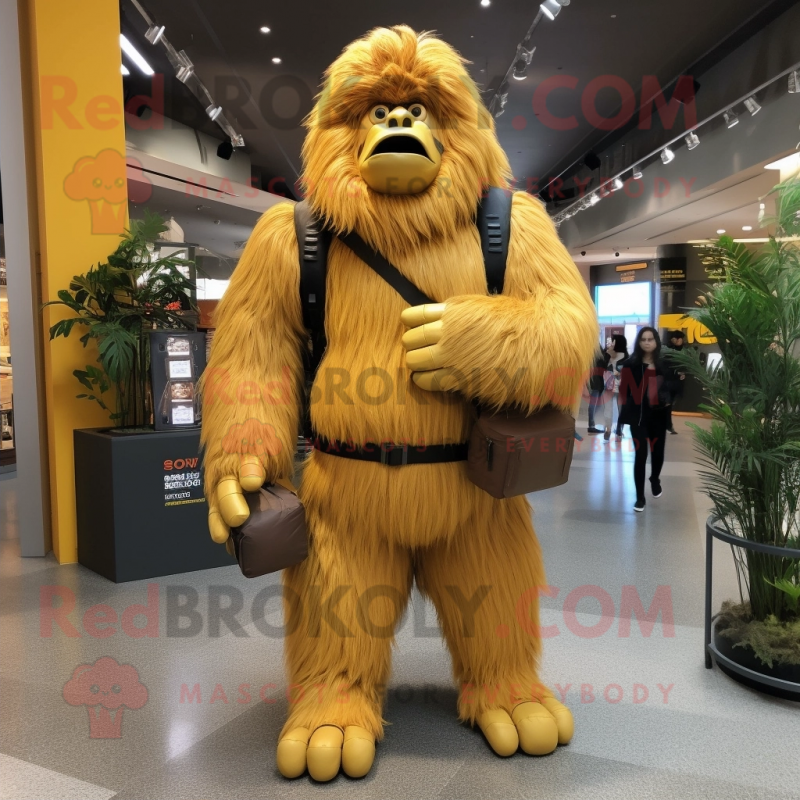 Gold Sasquatch mascot costume character dressed with a Cardigan and Backpacks Gold Sasquatch mascot costume character dressed with a Cardigan and Backpacks