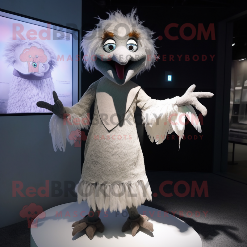 nan Harpy mascot costume character dressed with a Shift Dress and Gloves nan Harpy mascot costume character dressed with a Shift Dress and Gloves