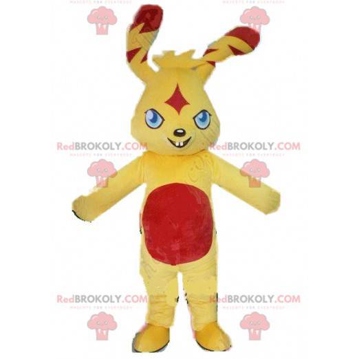 Mascotte de petit lapin jaune et rouge avec un méchant regard -