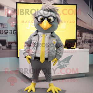 Gray Canary mascot costume character dressed with a Windbreaker and Tie pins