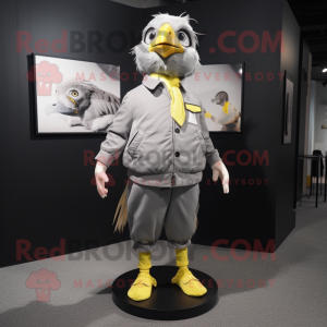 Gray Canary mascot costume character dressed with a Windbreaker and Tie pins