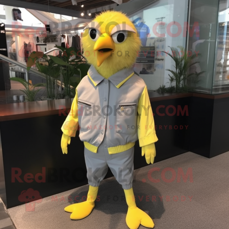 Gray Canary mascot costume character dressed with a Windbreaker and Tie pins Gray Canary mascot costume character dressed with a Windbreaker and Tie pins