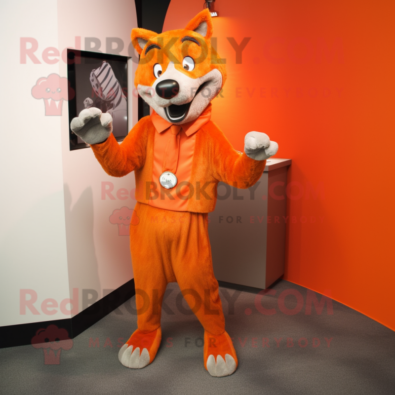 Orange Wolf mascot costume character dressed with a Pleated Skirt and Cufflinks Orange Wolf mascot costume character dressed with a Pleated Skirt and Cufflinks