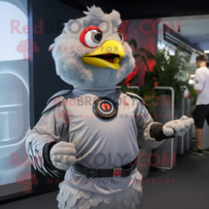 Gray Hens mascot costume character dressed with a T-Shirt and Smartwatches