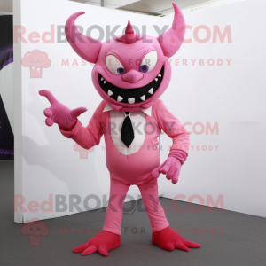 Pink Demon mascot costume character dressed with a Suit Pants and Wraps