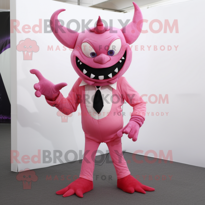 Pink Demon mascot costume character dressed with a Suit Pants and Wraps Pink Demon mascot costume character dressed with a Suit Pants and Wraps