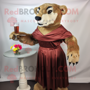 Brown Mountain Lion mascot costume character dressed with a Cocktail Dress and Shawl pins