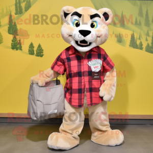 Cream Mountain Lion mascot costume character dressed with a Flannel Shirt and Tote bags