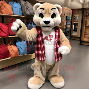 Cream Mountain Lion mascot costume character dressed with a Flannel Shirt and Tote bags