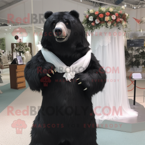 Black Sloth Bear mascot costume character dressed with a Wedding Dress and Scarf clips