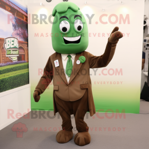 Brown Green Bean mascot costume character dressed with a Jacket and Cufflinks