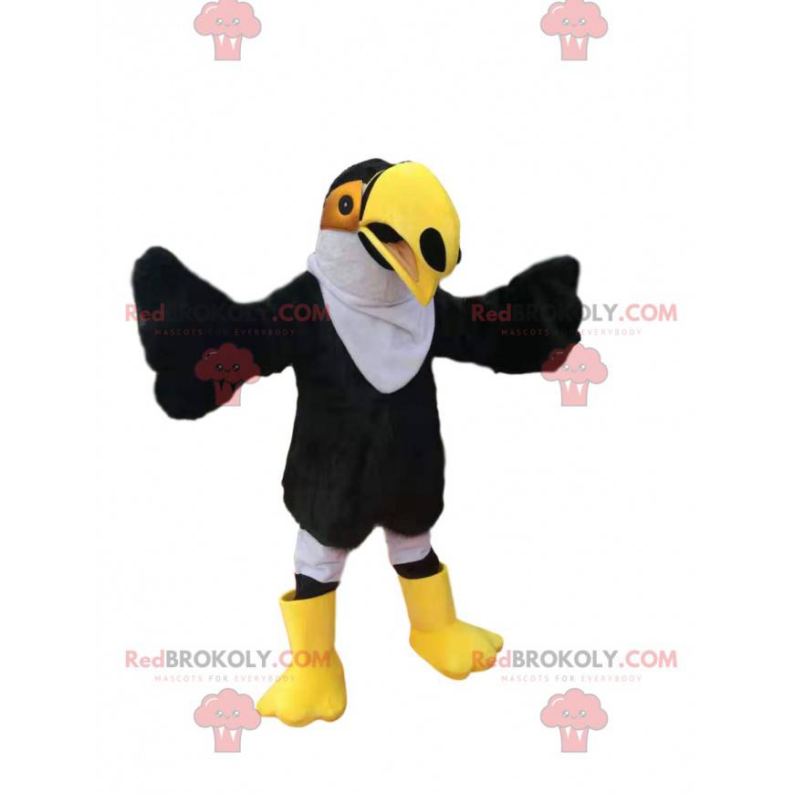 Mascote tucano preto e branco com um lindo bico amarelo -