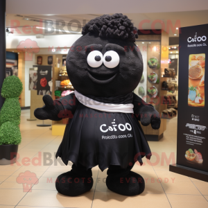 Black Potato mascot costume character dressed with a Polo Tee and Scarves