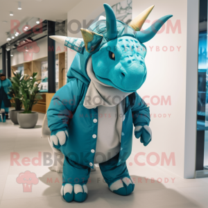 Turquoise Triceratops mascot costume character dressed with a Parka and Scarves