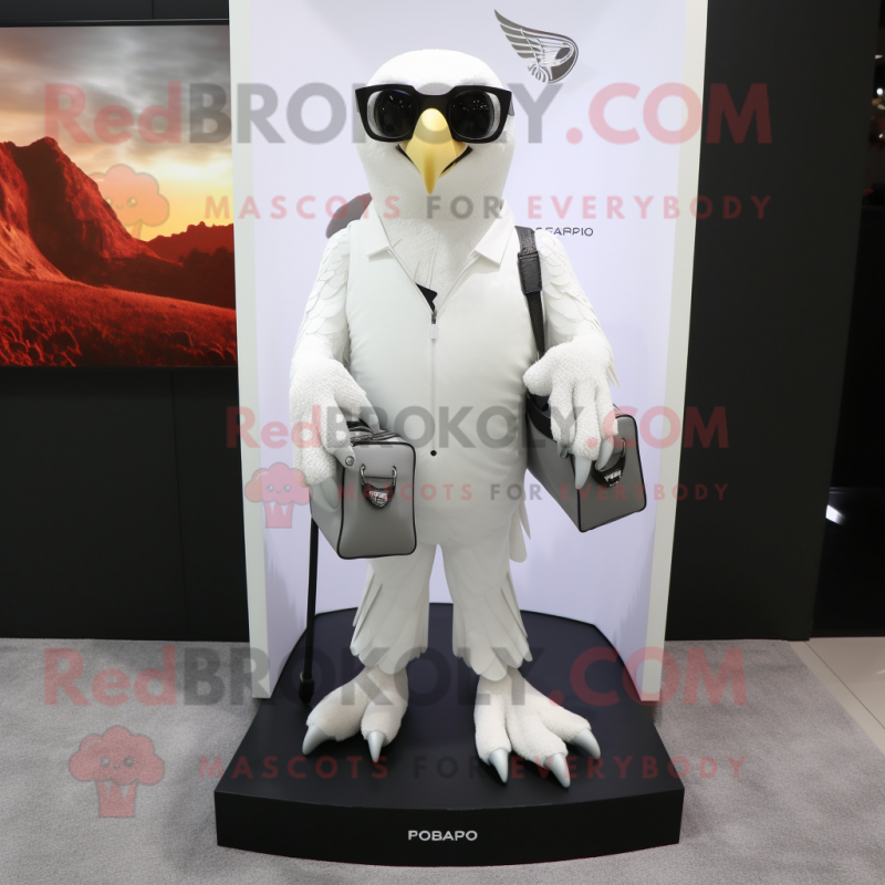 White Falcon mascot costume character dressed with a T-Shirt and Handbags