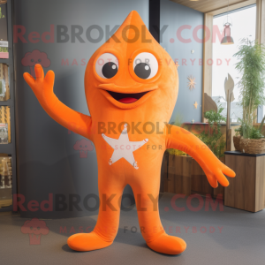 Orange Starfish mascot costume character dressed with a Jeggings and Foot pads