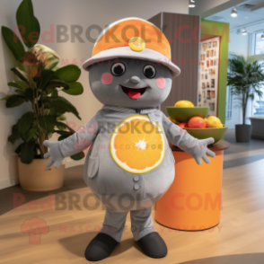 Gray Grapefruit mascot costume character dressed with a Rash Guard and Berets
