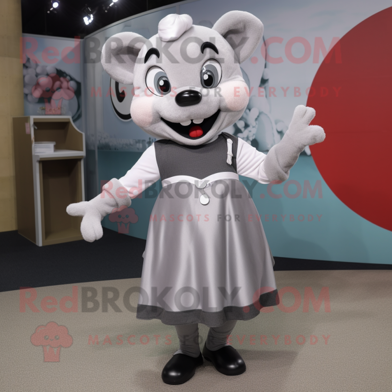 Silver But mascot costume character dressed with a Skirt and Suspenders Silver But mascot costume character dressed with a Skirt and Suspenders