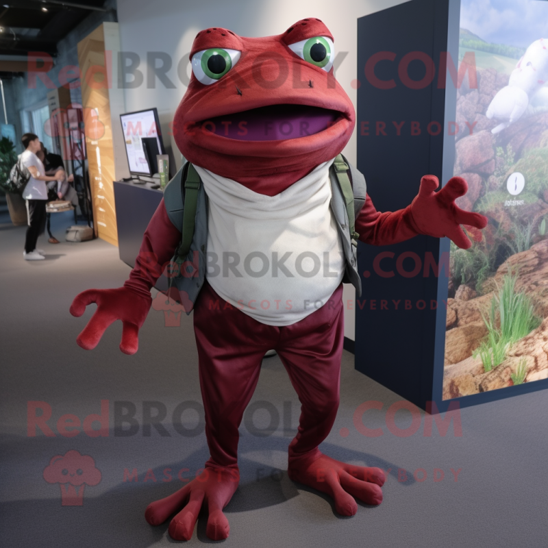 Maroon Frog mascot costume character dressed with a Chinos and Foot pads Maroon Frog mascot costume character dressed with a Chinos and Foot pads
