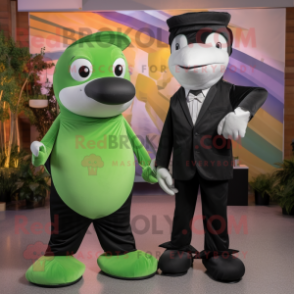 Lime Green Killer Whale mascot costume character dressed with a Tuxedo and Mittens