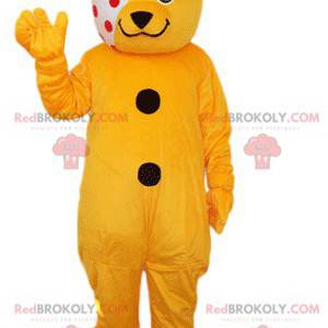 Orange bear mascot orange with a white bandage with red dots -