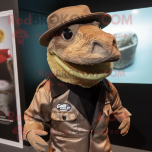 Brown Komodo Dragon mascot costume character dressed with a Leather Jacket and Hat pins