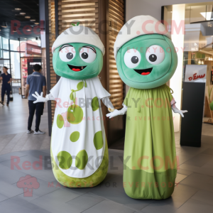 Olive Sushi mascot costume character dressed with a Maxi Dress and Brooches