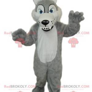 Mascotte de loup gris et blanc avec de grandes dents -