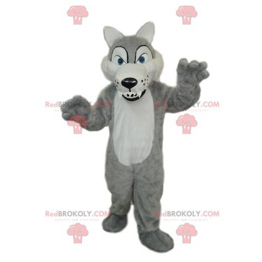 Mascotte de loup gris et blanc avec de grandes dents -