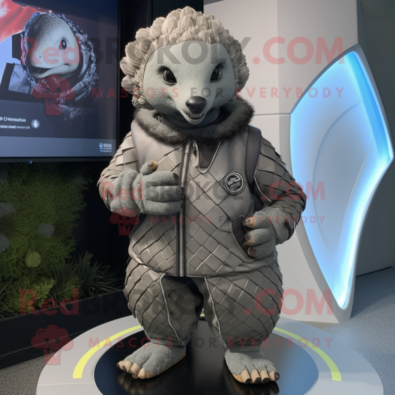 Gray Pangolin mascot costume character dressed with a Moto Jacket and Lapel pins