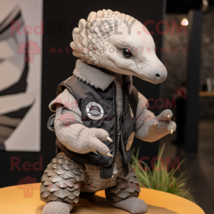 Gray Pangolin mascot costume character dressed with a Moto Jacket and Lapel pins