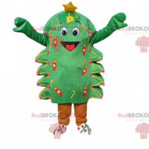 Kleine groene boom mascotte erg blij met een ster -