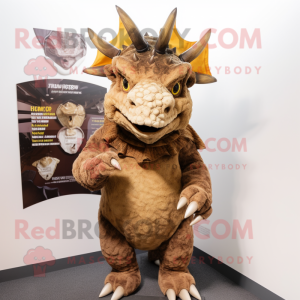 Brown Triceratops mascot costume character dressed with a T-Shirt and Shawl pins