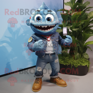 Blue Piranha mascot costume character dressed with a Denim Shirt and Smartwatches