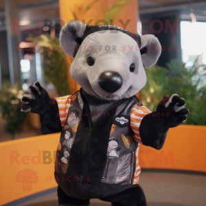 nan Tapir mascot costume character dressed with a Vest and Mittens