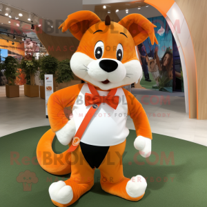 Orange Ermine mascot costume character dressed with a Running Shorts and Bow ties
