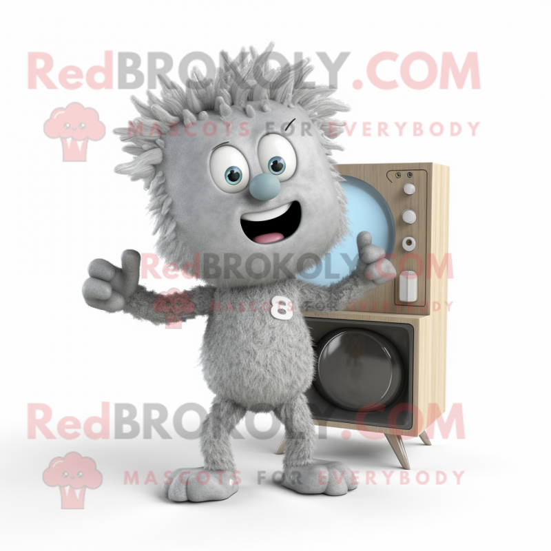 Gray Television mascot costume character dressed with a Romper and Brooches Gray Television mascot costume character dressed with a Romper and Brooches