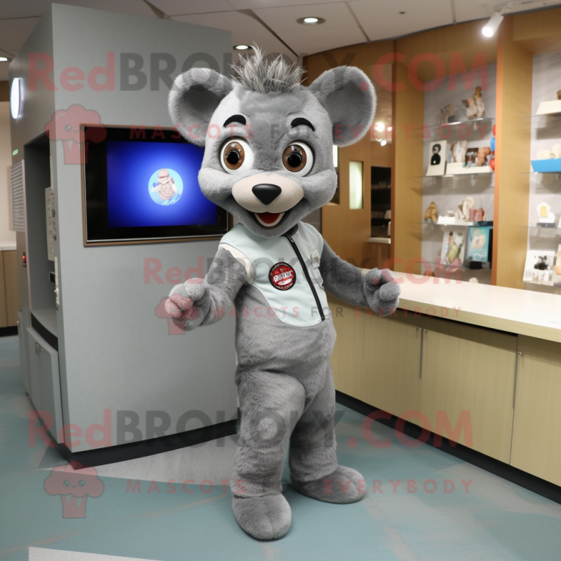 Gray Television mascot costume character dressed with a Romper and Brooches Gray Television mascot costume character dressed with a Romper and Brooches