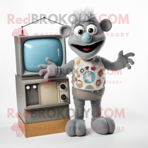 Gray Television mascot costume character dressed with a Romper and Brooches