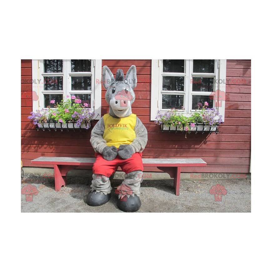 Šedý osel maskot v žluté a červené oblečení - Redbrokoly.com Šedý osel maskot v žluté a červené oblečení - Redbrokoly.com