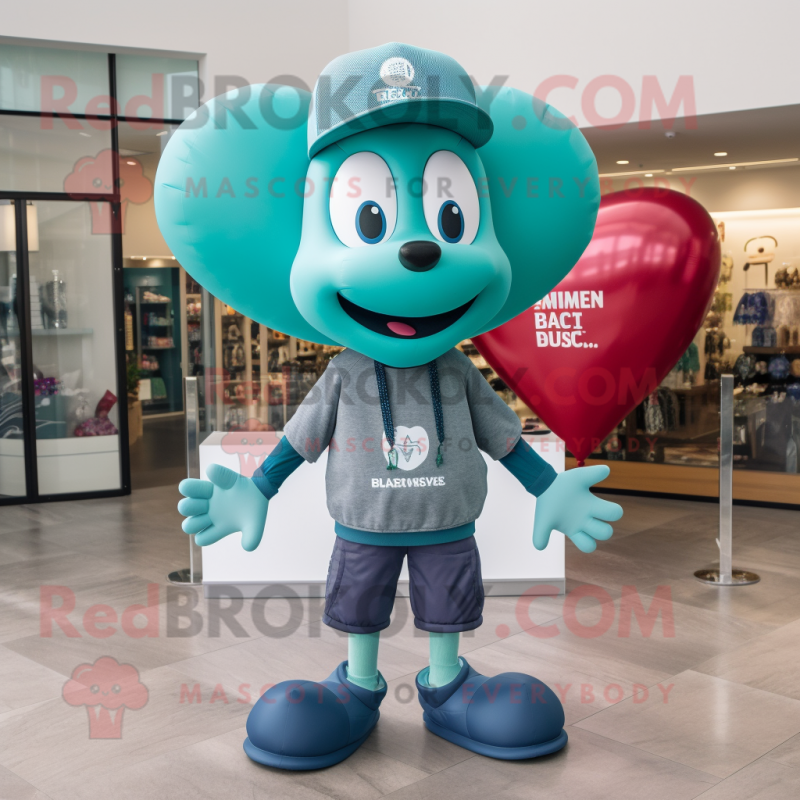 Teal Heart Shaped Balloons mascot costume character dressed with a Bermuda Shorts and Beanies