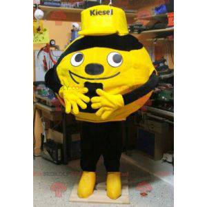 Mascote bola amarela ou laranja e preta - Redbrokoly.com