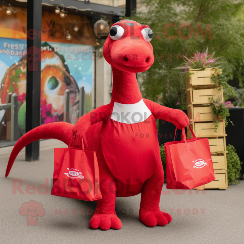 Red Diplodocus mascot costume character dressed with a Mini Dress and Tote bags