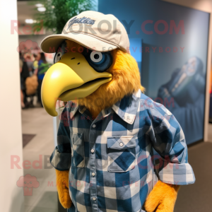 Yellow Haast'S Eagle mascot costume character dressed with a Chambray Shirt and Caps