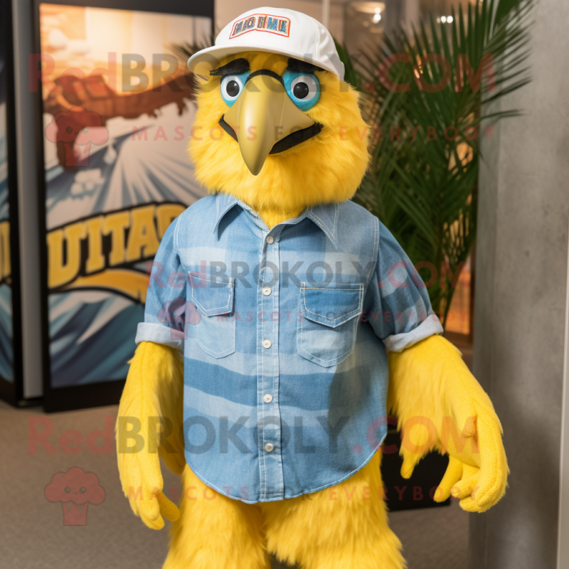 Yellow Haast'S Eagle mascot costume character dressed with a Chambray Shirt and Caps