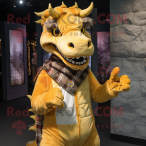 Gold Dragon mascot costume character dressed with a Flannel Shirt and Mittens